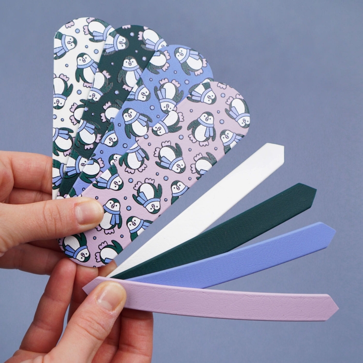 Kolorystyka i materiał szelek dla psa z Biothane – wzór pingwinki, połączenie zieleni i jasnego fioletu, wodoodporne szelki spacerowe