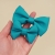 turkusowa kokardka dla psa w dwóch rozmiarach S i M